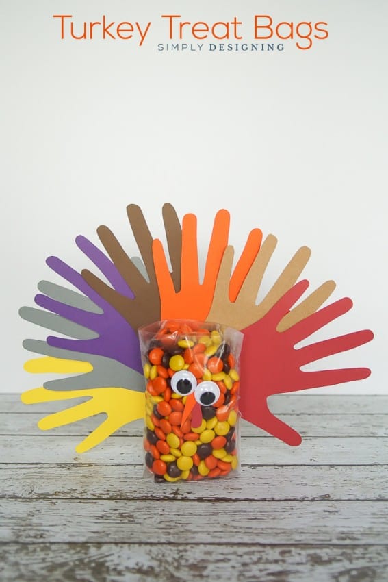 Handprint Turkey Treat Bags - these simple treat bags are so fun for kids to be involved in creating