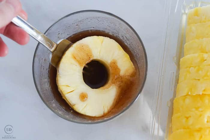 dip pineapple in sugar mixture
