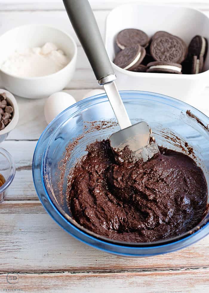 stir brownie ingredients together