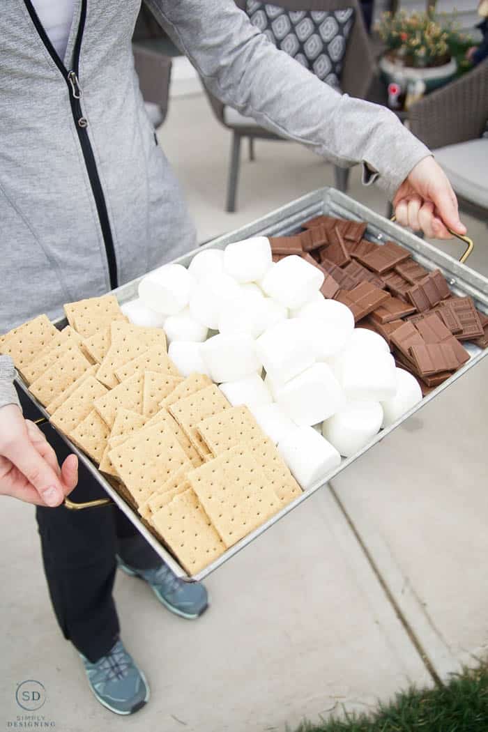 s'mores ingredients on galvanized tray