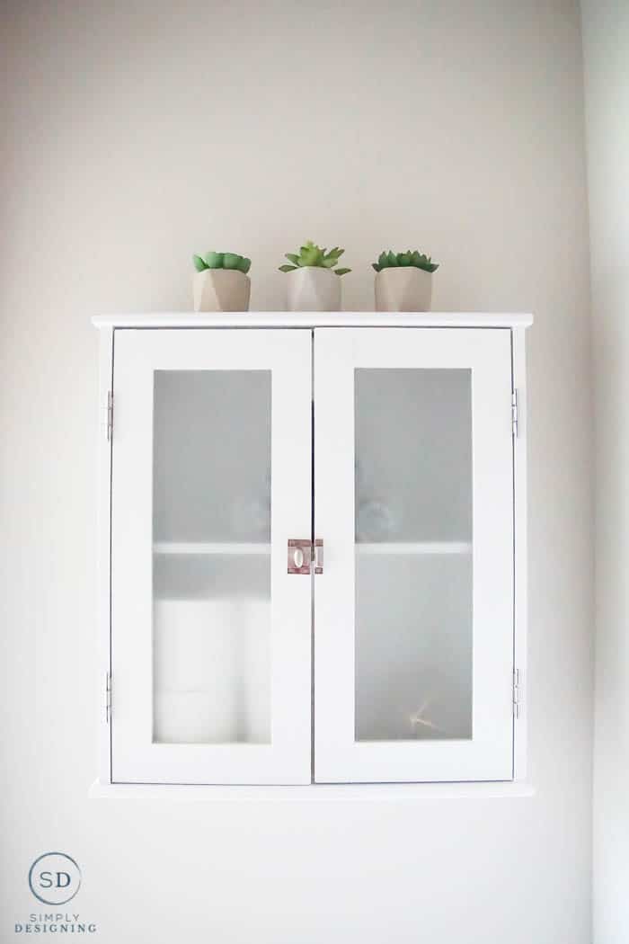 cute white wall storage for your bathroom