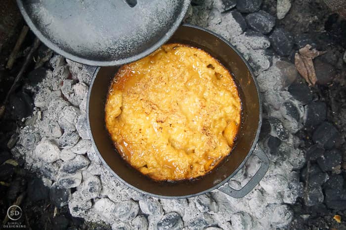 peach cobbler cooked in dutch oven