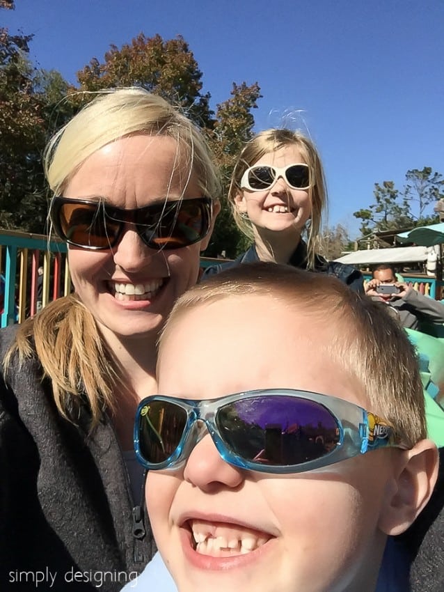 Simply Designings Ashley Phipps and Children on the Triceratops Spin at Disney's Animal Kingdom