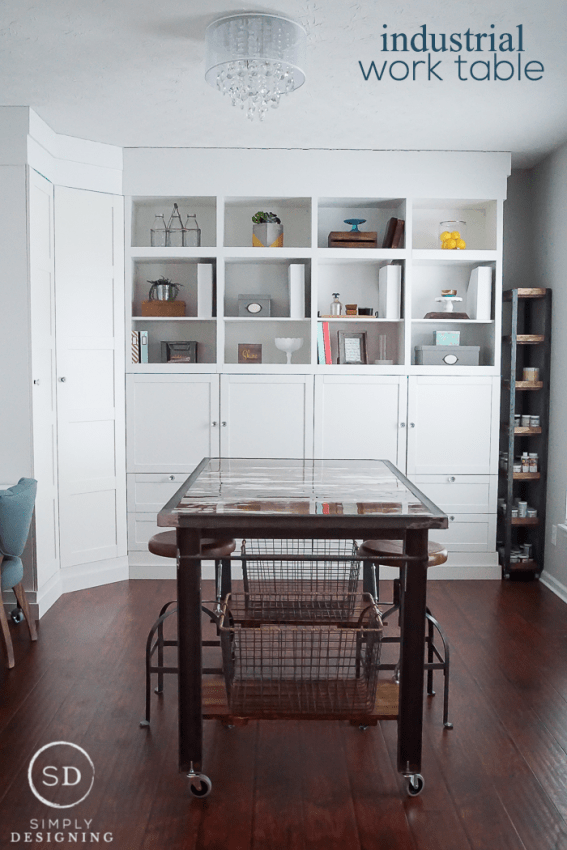 DIY Industrial Work Table - this insustrial work table incorporates beautiful rustic barn wood and metal details